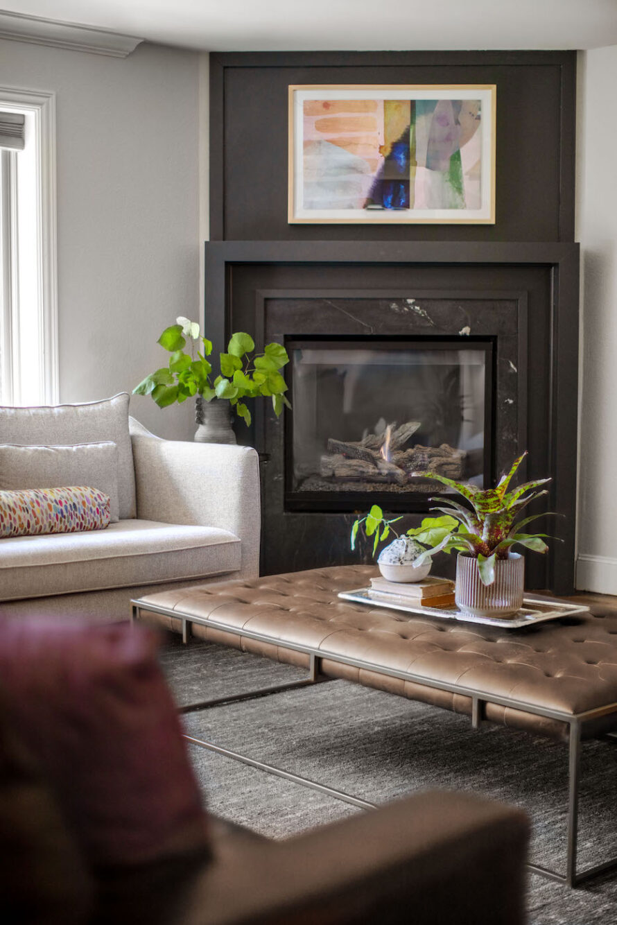 living-room-fireplace-leather-coffee-table-ottoman