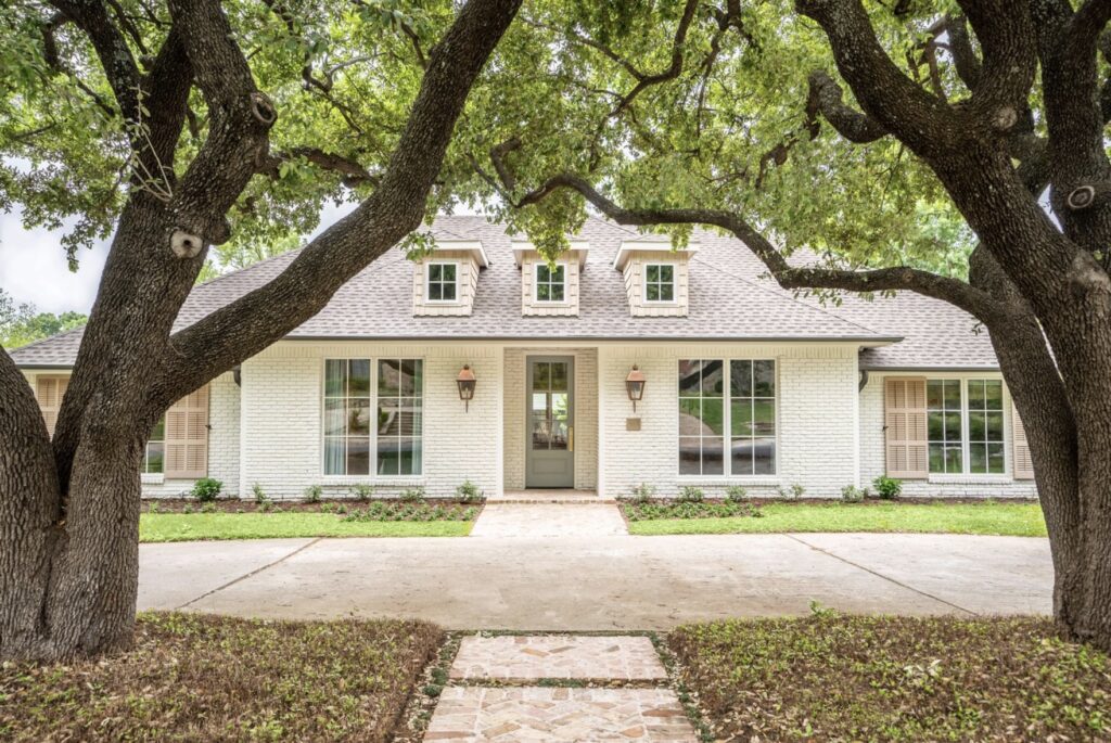 Classic ranch style home with traditional details and lovely proportions in Dallas, TX.