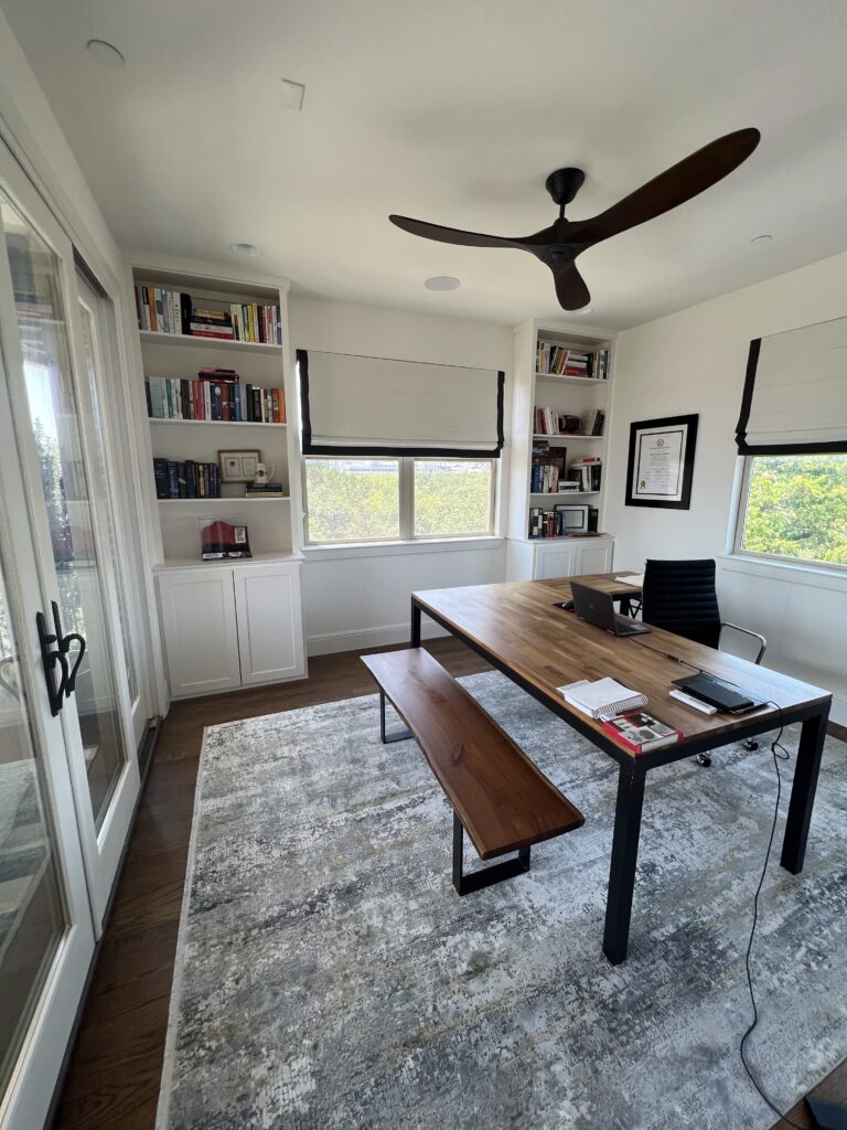 before image of dallas uptown home study with white walls and oversized furniture