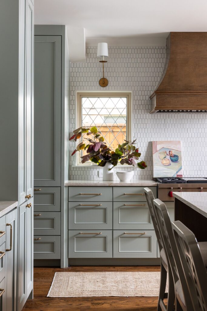 Kitchen section: Sage green kitchen cabinets with brass hardware, Richardson Texas home renovation